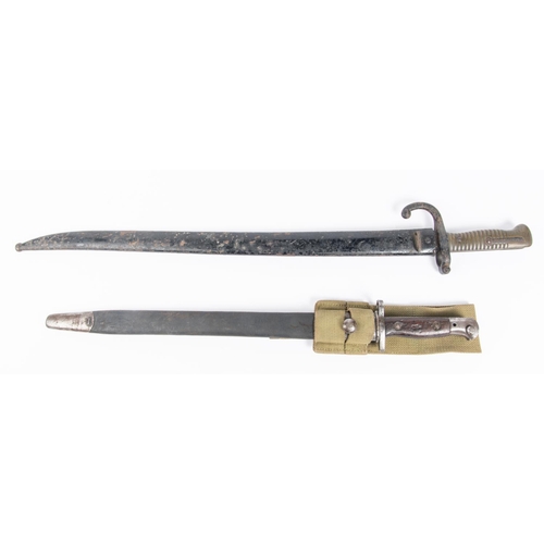 447 - A Chassepot bayonet dated 1874, in its scabbard (blade well pitted); a 1907 bayonet (scabbard well w... 