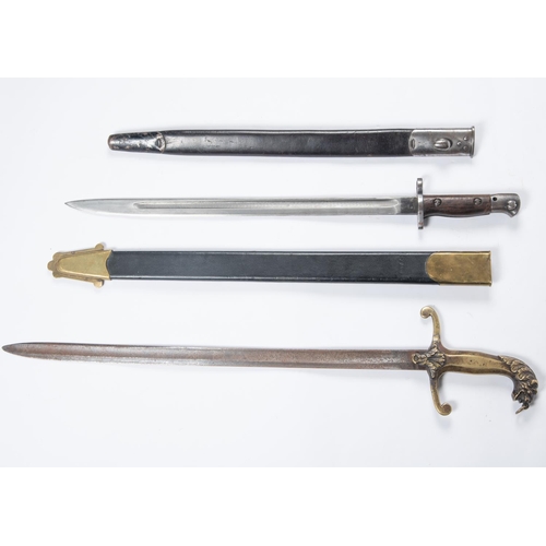 449 - A 1907 patt SMLE Bayonet, in its black leather scabbard; a Georgian band sword with cast brass lion ... 