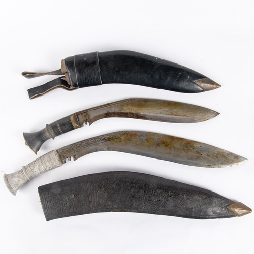 452 - A Gurkha kukri, with horn hilt and black leather sheath, also skinning knives; another similar with ... 