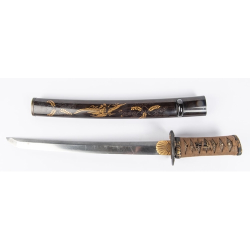 460 - A nicely mounted short wakizashi with o-suriage unsigned blade 31.4cms, some chips and edge nicks. S... 