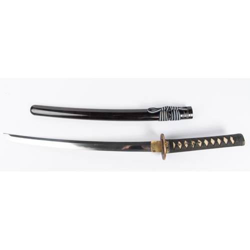 461 - A well mounted wakizashi, unsigned, one mekugi ana, 17th century, with irregular gunome hamon. 1 sma... 