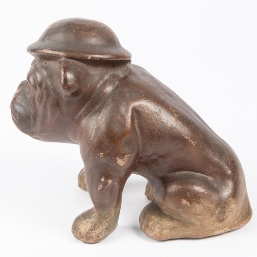 8 - A WWII pottery bulldog figurine, with Winston Churchill's type face wearing steel helmet. GC £70-80