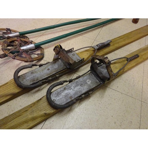 18 - A good pair of vintage wooden skis, complete with pair of sticks. GC £30-40