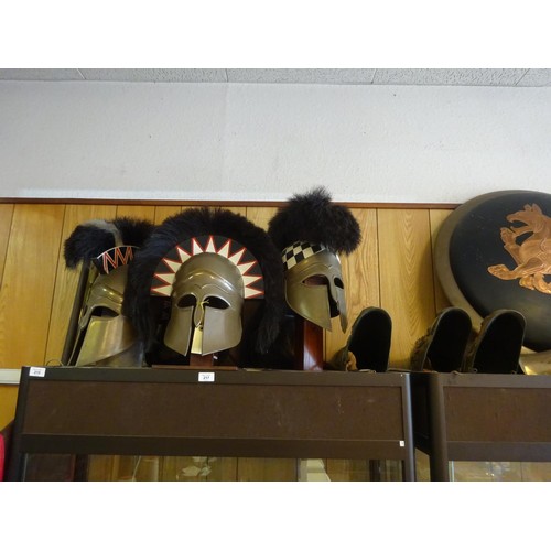 215 - Re-enactment ancient Greek Hoplite fibreglass armour, comprising 3 crested helmets and 3 pairs of le... 