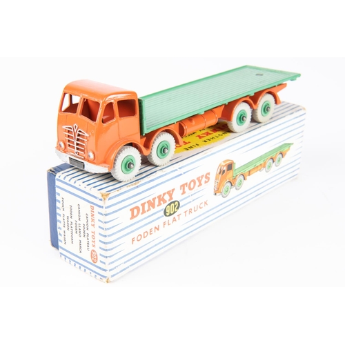 320 - Dinky Toys Foden Flat Truck (902). Orange cab and chassis, mid-green body and wheels. Boxed, minor w... 