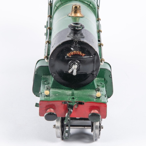 125 - A Hornby O gauge clockwork No.3 4-4-2 locomotive. GWR Caerphilly Castle 4073, in lined green livery.... 