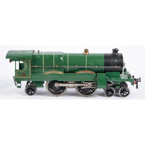 125 - A Hornby O gauge clockwork No.3 4-4-2 locomotive. GWR Caerphilly Castle 4073, in lined green livery.... 