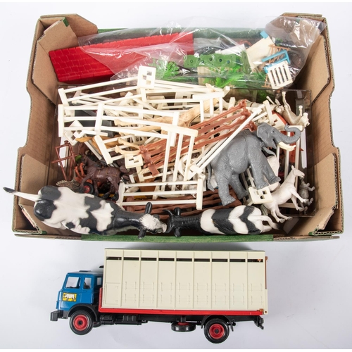 151 - Small quantity of various makes. A Britains Farmyard No.4711. Comprising a plastic moulded farmyard ... 