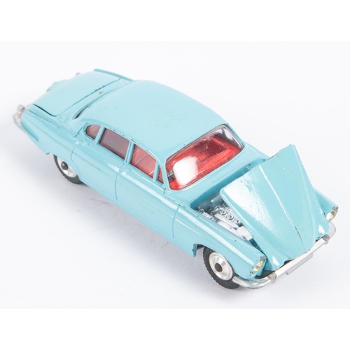 283 - A Corgi Toys Jaguar Mark X (238). In light blue with red interior and dished spun wheels. Boxed, min... 