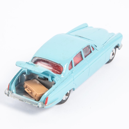 283 - A Corgi Toys Jaguar Mark X (238). In light blue with red interior and dished spun wheels. Boxed, min... 