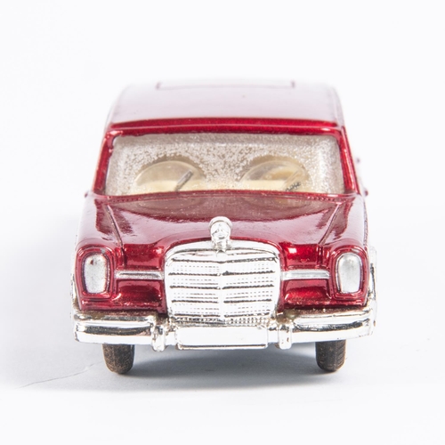 284 - Corgi Toys Mercedes Benz 600 Pullman (247). A lighter red example with cream interior, complete with... 