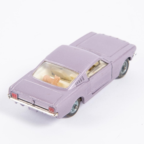 285 - Corgi Toys Ford Mustang Fastback 2+2 (320). In metallic lilac with cream interior, example with spok... 