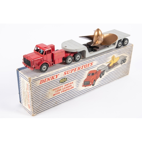 317 - A Dinky Supertoys Mighty Antar Low Loader with Propeller load (986). Red tractor unit with grey trai... 