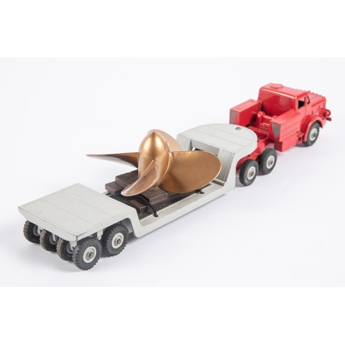 317 - A Dinky Supertoys Mighty Antar Low Loader with Propeller load (986). Red tractor unit with grey trai... 