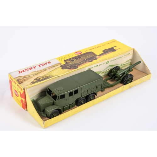 324 - A Dinky Toys Gift Set 695. A 7.2 howitzer & a medium artillery tractor, complete with tin tilt. In a... 