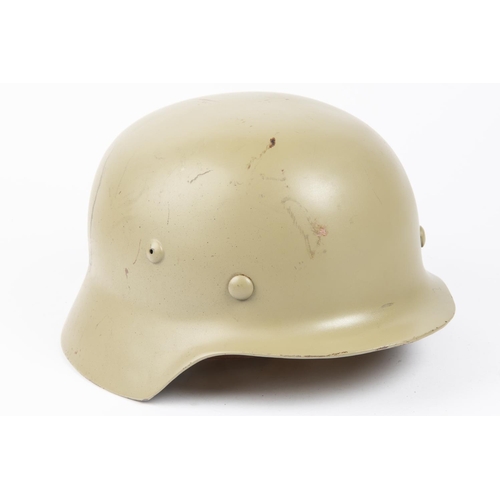 201 - A Third Reich M36 steel helmet, no decals, light grey/green finish, lining possibly post war. VGC £1... 