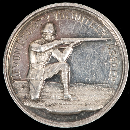 122 - Devon County Volunteer Assocn. silver medal, obverse struck kneeling rifleman right with engraved le... 