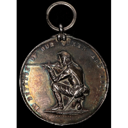 143 - A Victorian shooting medal in silver, obverse oak and laurel spray enclosing engraved inscription 