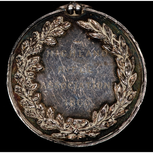 143 - A Victorian shooting medal in silver, obverse oak and laurel spray enclosing engraved inscription 