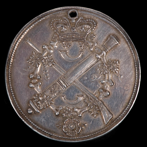 145 - A Georgian silver shooting award, 1808, obverse device of crowned crossed cannon and flintlock muske... 