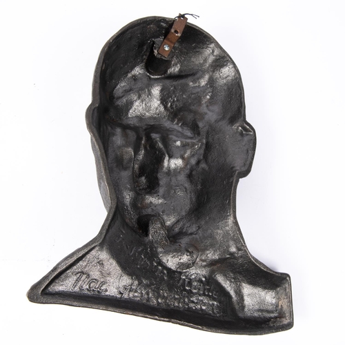 182 - A Third Reich cast metal bust of Hitler, front face in relief, 13