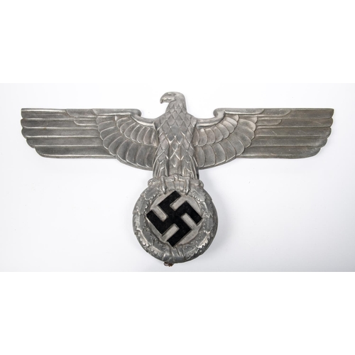 183 - A good Third Reich metal eagle and swastika, removed from a building or vehicle, 26