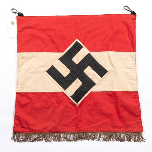 186 - A Third Reich Hitler Youth trumpet banner, with applied device, 2 metal suspension clips, and fringe... 