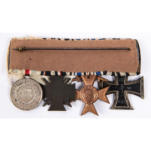 190 - A group of four WWI German medals: 1914 Iron Cross 2nd class, Bavarian Military Merit Order with cro... 