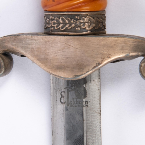 205 - A Third Reich Army officer’s dagger, with post 1941 Eickhorn mark, orange grip and plated mounts, in... 