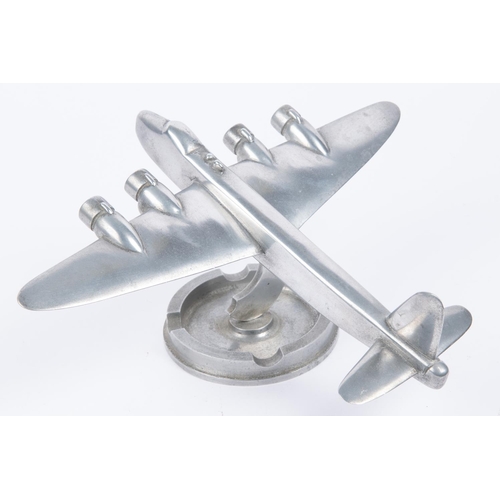 21 - A cast aluminium desk ornament/ashtray, in the form of a WWII Short Stirling four engined bomber, wi... 