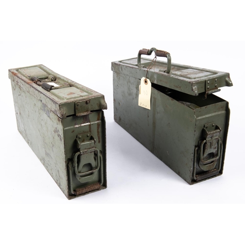 232 - A post war German machine gun ammunition box, containing petroleum and oil canisters. VGC also a sim... 