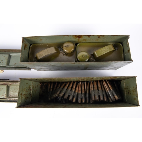 232 - A post war German machine gun ammunition box, containing petroleum and oil canisters. VGC also a sim... 