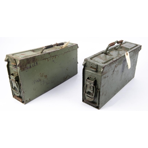 232 - A post war German machine gun ammunition box, containing petroleum and oil canisters. VGC also a sim... 