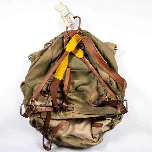 236 - A military type rucksack, 4 WWII military canvas buckets, 3 haversacks; 2 US Army deceased effects b... 