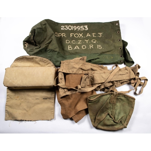 236 - A military type rucksack, 4 WWII military canvas buckets, 3 haversacks; 2 US Army deceased effects b... 