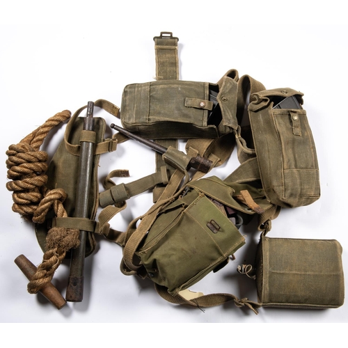 238 - A set of WWII infantrymans 1937 webbing, comprising waistbelt, cross straps, ammunition pouches with... 