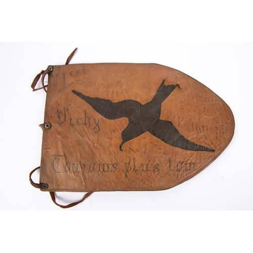 241 - A very interesting Vichy French brown leather pennant, applied leather bird motif, hand written 