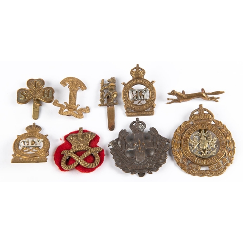 259 - Nine Yeomanry cap badges: Warwickshire by Gaunt, Staffordshire with QVC (brooched), 1915-22 Leiceste... 