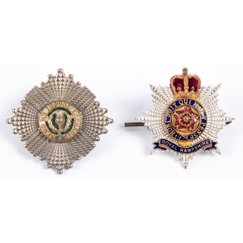 263 - Scots Guards WO and QEII Royal Hampshire Regt officers silvered, gilt and enamel cap badges. GC (2) ... 