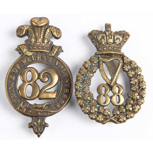 281 - Pre 1881 brass glengarry badges of the 82nd and 88th Regiment of Foot (K&K 551 and 559), GC £60-80