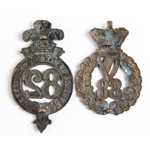 281 - Pre 1881 brass glengarry badges of the 82nd and 88th Regiment of Foot (K&K 551 and 559), GC £60-80