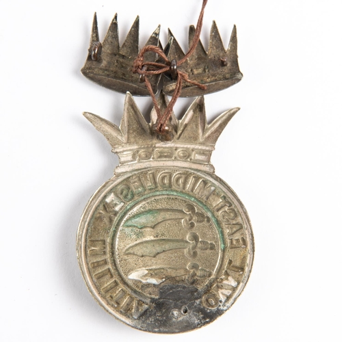 290 - A white metal glengarry badge of the Royal East Middlesex Militia (one lug missing), and a matching ... 