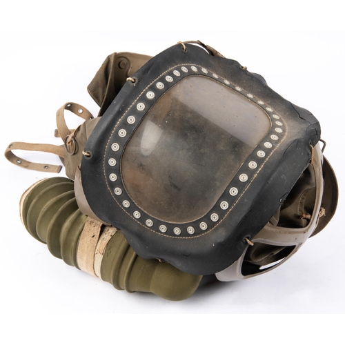 31 - A WWII baby's gas mask, some perishing to rubber otherwise GC £30-40