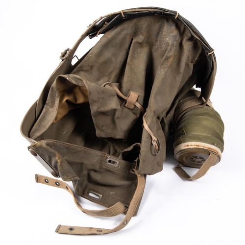 31 - A WWII baby's gas mask, some perishing to rubber otherwise GC £30-40