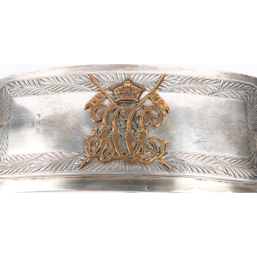 321 - A late Victorian Indian Lancers hall marked silver pouch flap, mounted with Imperial crown above “HC... 