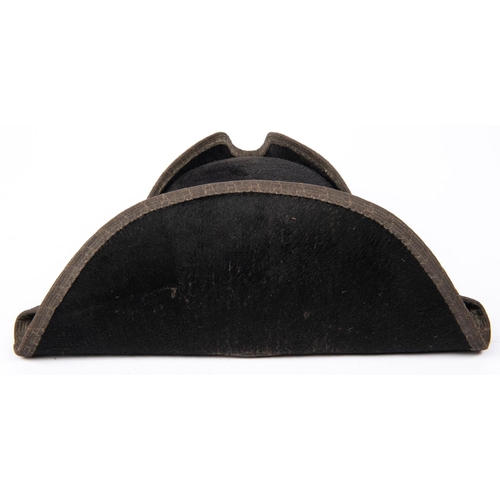 325 - A 19th century tricorn hat, with bullion lace edging to the brim (dull), leather sweat band, and sil... 