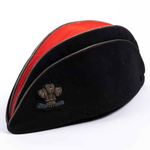 327 - An early 20th century officer’s tent cap of the 10th Hussars, with bullion Prince of Wales’ feather ... 