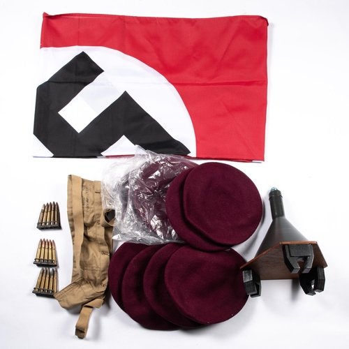 331 - 11 post war Airborne berets, (in new condition), 3 clips of inert 303 rounds, a modern swastika flag... 