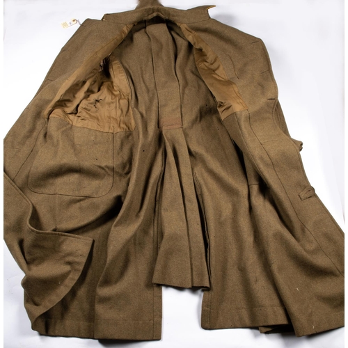 334 - A scarce Yeomanry officers khaki greatcoat c 1902, it is a light shade of khaki and has yellow pipin... 