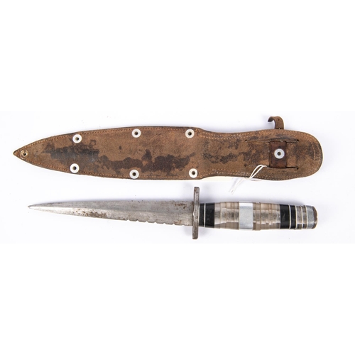 348 - An unusual fighting knife, following the design of a Fairbairn Sykes knife, in its leather sheath, s... 